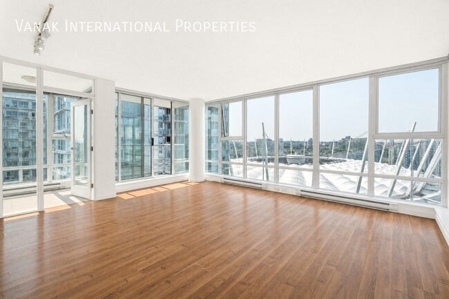 Building Photo - 2 Bed + Den + Solarium | 2 Bath | Parking | Spectrum