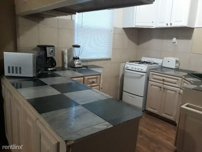 Foto del edificio - 5 br, 3 bath House - 11804 Georgia Ave