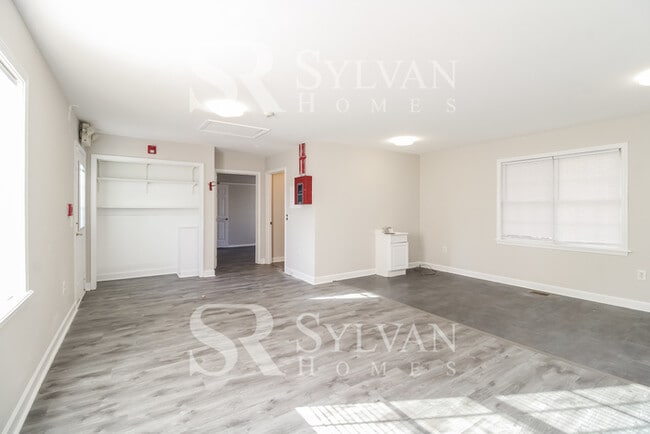 Building Photo - The living is easy in this 3 bedroom, 2.5 bathroom home