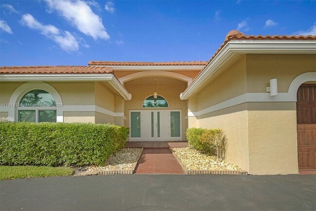 Building Photo - 10133 NW 48th Dr