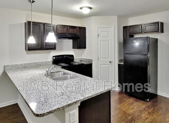 Building Photo - 8423 McGirts Village Ln