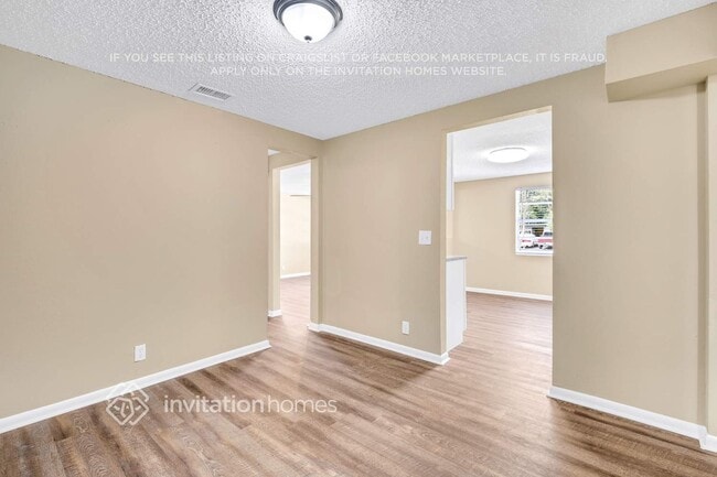 Building Photo - 6968 Delisle Dr