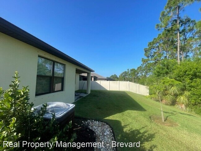 Building Photo - 5 br, 2.5 bath House - 4318 Alligator Flag...