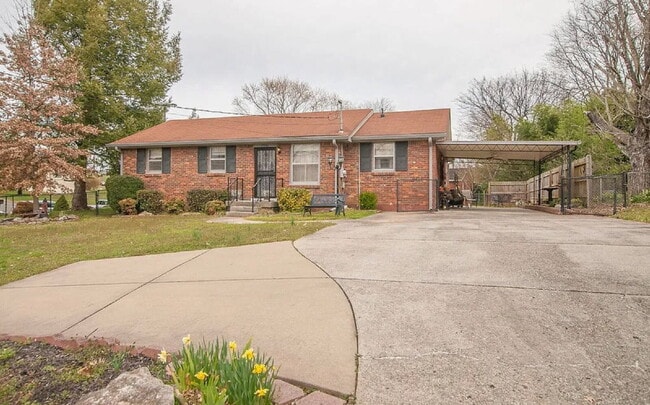 Photo - "Charming 2-Bed Home with Spacious 1700 Sq Ft Layout, FENCED yard!"
