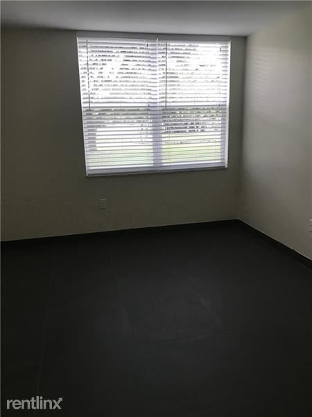 Building Photo - 2 br, 2 bath  - 9420 Tangerine Pl Apt 102B