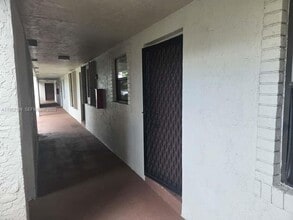 Building Photo - 7406 Woodmont Terrace