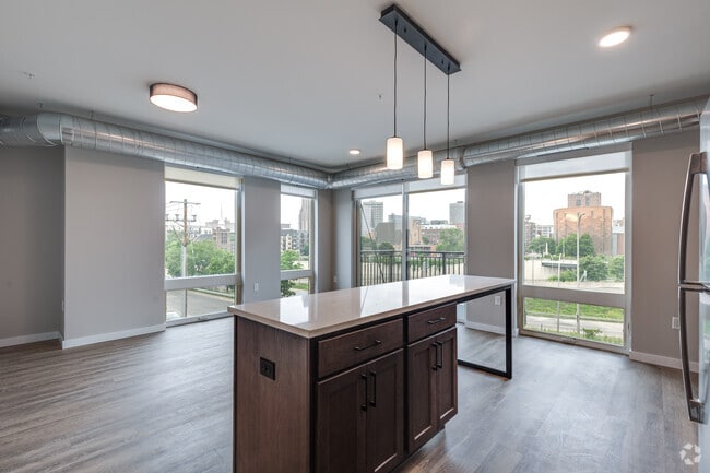 2BR, 2BA - 824SF - Kitchen and Living Room - Balsam on Broadway