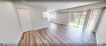 This recently updated 1-bedroom, 1-bathroom apartment in Fairfax, VA offers 640 square feet of efficiently designed living space. The open-concept floor plan seamlessly integrates the living room, dining area, and kitchen, creating a spacious feel. The kitchen boasts white cabinetry, stainless steel appliances, and a subway tile backsplash, perfect for the home chef.

The primary bedroom, measuring 170 square feet, features plush carpeting and a large window, providing natural light and a cozy atmosphere. A sliding door closet offers ample storage space. The bathroom showcases modern fixtures, including a framed mirror and a sleek vanity.

Throughout the apartment, recessed lighting and light-colored walls enhance the bright, airy ambiance. The living areas are adorned with durable, wood-look flooring, while the bedroom offers soft, neutral carpeting. A sliding glass door in the living room leads to an outdoor area, extending the living space and allowing for indoor-outdoor flow.

This well-designed apartment combines functionality with style, making it an ideal home for those seeking a contemporary living space in a convenient Fairfax location.