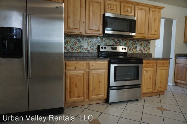 Building Photo - 4 br, 2.5 bath House - 4141 W. 5010 S.