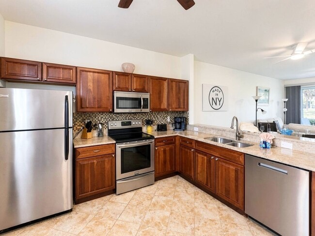 Building Photo - Beautifully furnished 2BR/2BA first-floor condo