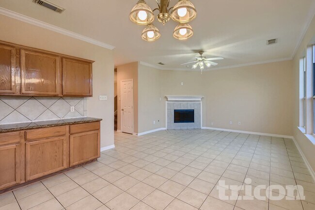 Foto del edificio - 9711 Sugarblossom Ln