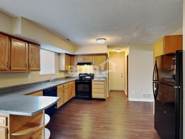 Foto del edificio - 5363 Rolling River Ct