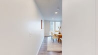 Located in Bozeman, MT, this modern two-story residence offers four bedrooms and four bathrooms across two well-proportioned floors. The main level is anchored by an open-concept kitchen and dining area, showcasing white shaker-style cabinetry, warm wood accents, subway tile backsplash, stainless steel appliances, and a large central island with seating for multiple guests — ideal for both everyday living and entertaining. Recessed lighting and wood-look flooring run throughout, lending a clean, cohesive aesthetic. The dining area is bathed in natural light through expansive floor-to-ceiling windows, creating a bright and welcoming atmosphere. The adjacent living room provides additional gathering space that flows seamlessly from the kitchen. Upstairs, the four bedrooms offer comfortable retreats, including a generously sized primary bedroom. Additional bedrooms, one of which is well-suited as a home office with large windows and outdoor views, provide flexible living options. Two closets offer convenient storage. The four bathrooms are finished with crisp, neutral tones and contemporary fixtures. The overall design emphasizes clean lines, an abundance of natural light, and a modern yet warm ambiance throughout.