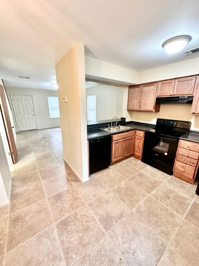 Building Photo - Nicely remodeled 2 bedroom end unit town h...