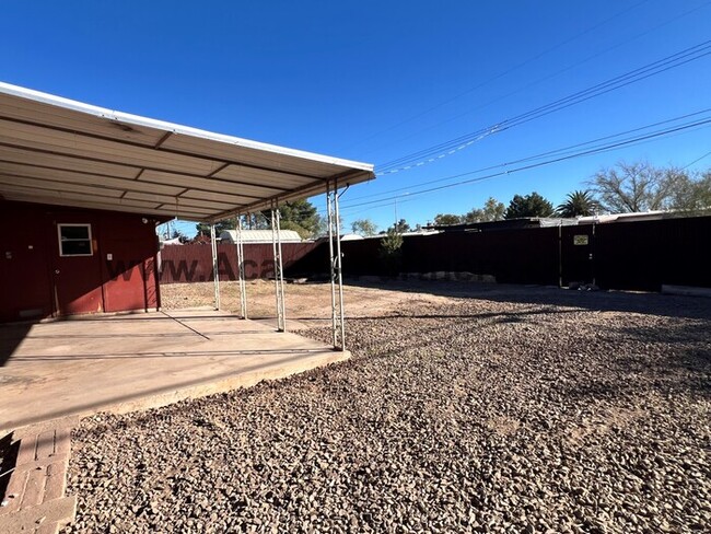 Building Photo - 3 Bedroom with Carport and Private Yard