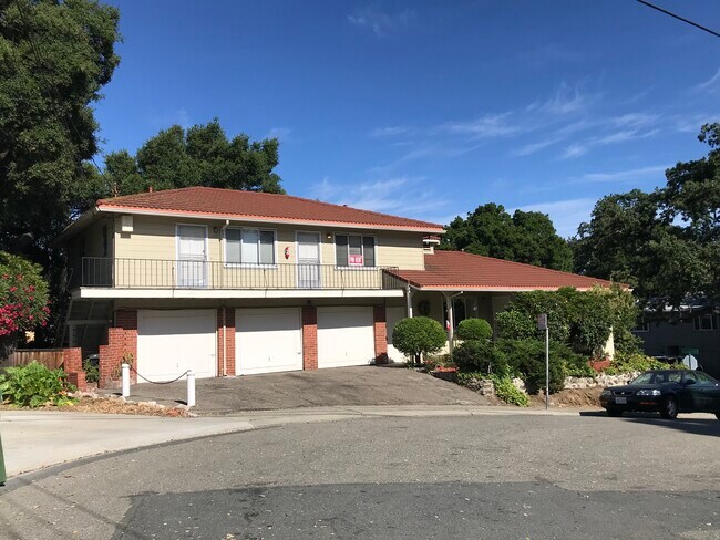 Exterior (unit on the top left). One shared wall. No downstairs neighbors. - 1501 Carmel Dr