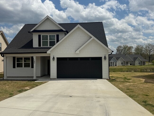 Photo - Beautiful New Build 4 Bed, 3.5 Bath, 2 Car Garage - Community Pool & Walking Trail! House