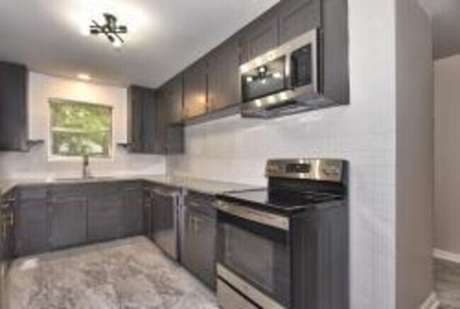 Building Photo - 5747 S Quincy Pl