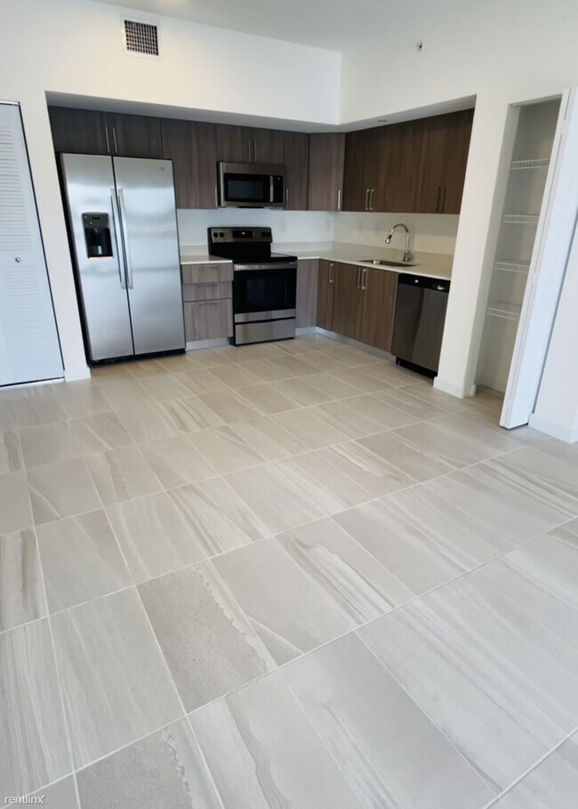 Building Photo - 1 br, 1 bath Condo - 7321 NW 46th St NEW B...