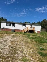 Building Photo - 128 Reginald Russell Rd
