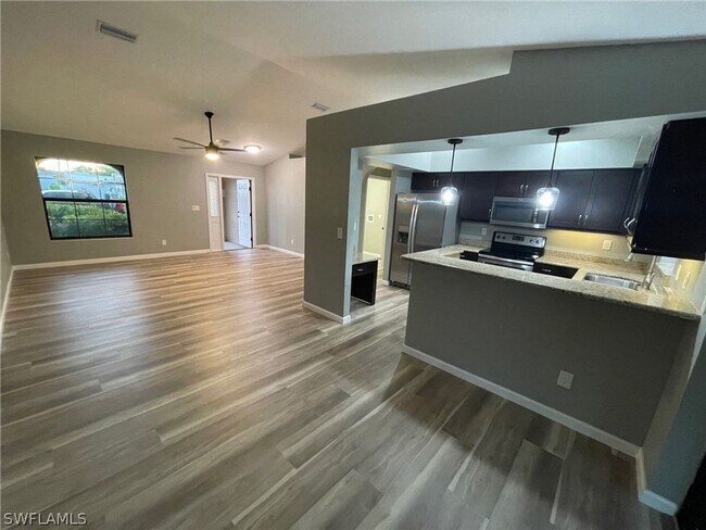 Building Photo - Beautiful 3/2/2- NE Cape Coral- SEE IT TODAY!