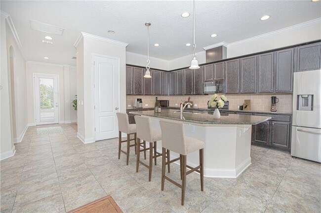 Foto del edificio - 8556 Tavistock Lakes Blvd