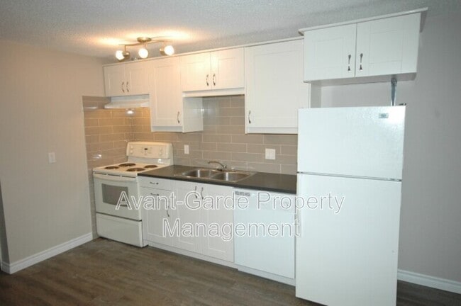 Building Photo - 3003-3131 131 Ave NW