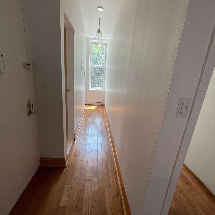 foyer to bath and kit - 852 Fulton St