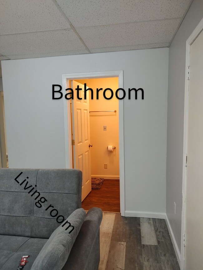 Bathroom w tub & overhead shower. - 6588 Log Cabin Ln