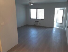 Building Photo - 2100 NE 51st Ct