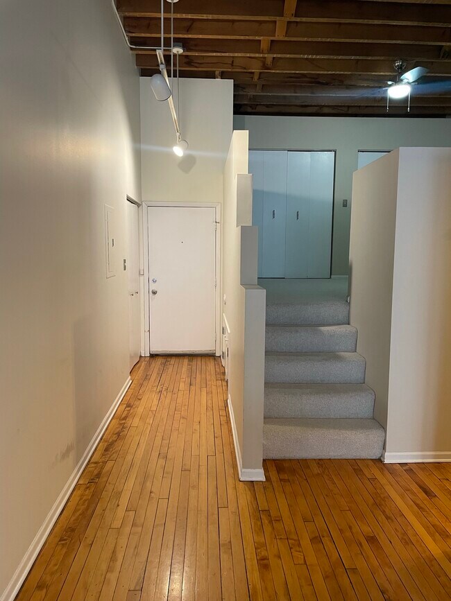 In the kitchen, facing front door and lofted bedroom - 3201 N Seminary Ave