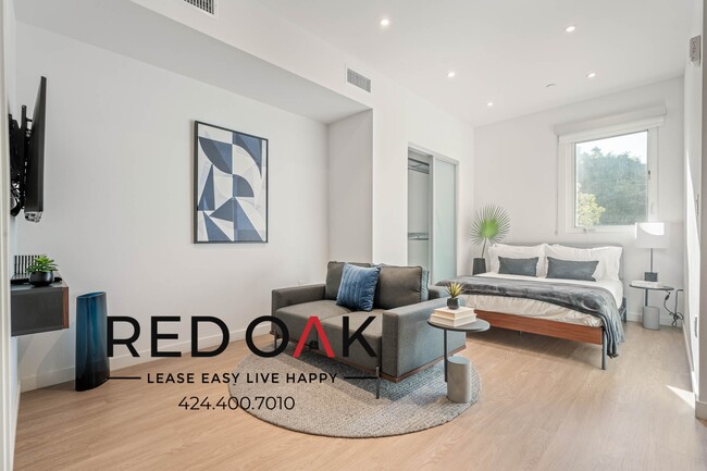 Building Photo - 6 WEEKS FREE! Furnished Bachelor With Laun...