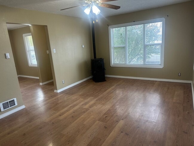 Building Photo - Room-room-room!  Fenced back yard, Private...