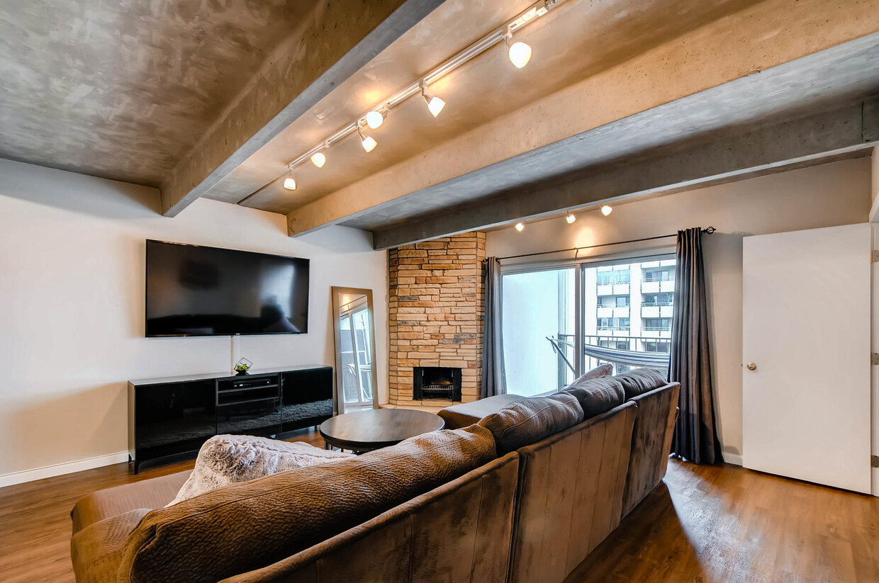Living Room with wood burning fireplace - 777 N Washington St