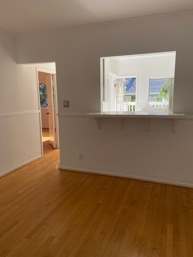 Main Room Views to Lg. Master Bedroom Entry, Breakfast Bar and Back Patio through Kitchen. - 2107 Vine St