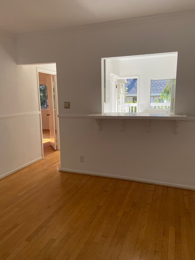 Main Room Views to Lg. Master Bedroom Entry, Breakfast Bar and Back Patio through Kitchen. - 2107 Vine St