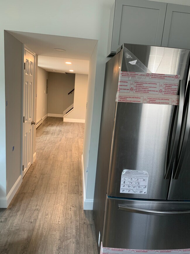 Hallway from Kitchen to Living Room - 261 Main St
