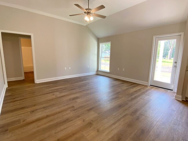 Building Photo - $500 Move-in Discount! Modern 4-Bedroom Home with Fenced Yard Near Moody AFB