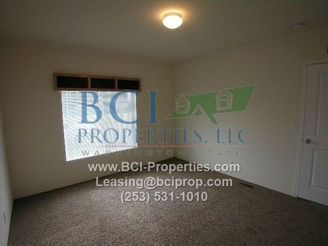 Building Photo - Welcome Home to Evergreen Place Condominiu...
