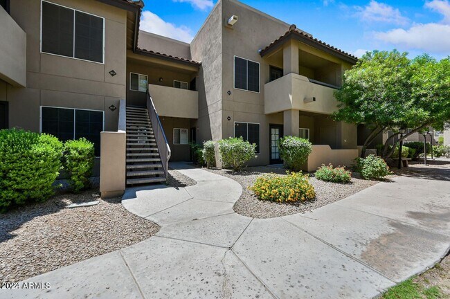 Building Photo - 9451 E Becker Ln