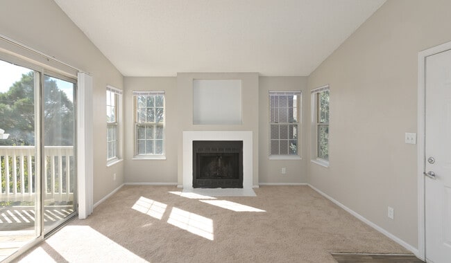 Cozy comfort meets modern style by the hearth. - Arcadia Apartment Homes