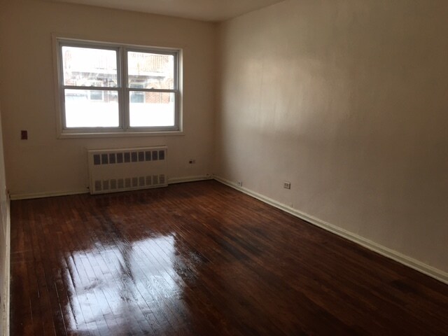 Bedroom with hard wood floor - 2645 Batchelder St