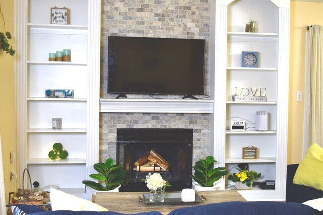 Newly updated stone wood burning fireplace - 210 Alder Wood Dr