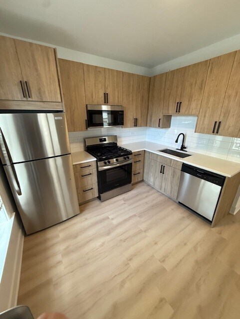Foto del edificio - 6971 N Bell Ave