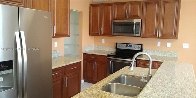 Building Photo - 10541 SW 24th Ct