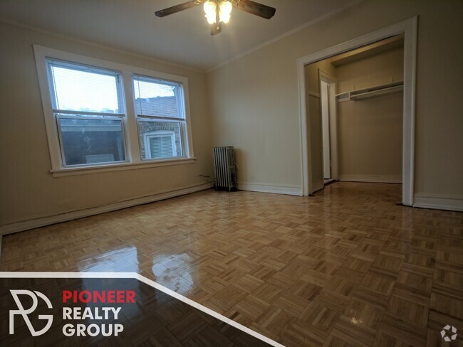 Building Photo - 705 W Belmont Ave