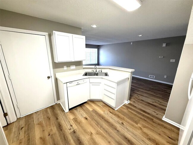 Building Photo - 6855 Woodland Ave