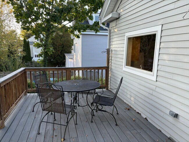 Rear elevated patio with water peaks when the leaves are down - 47 Trumbull Ave