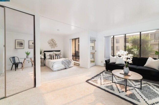 Building Photo - $500 OFF FIRST MONTH RENT - Studio Condo A...