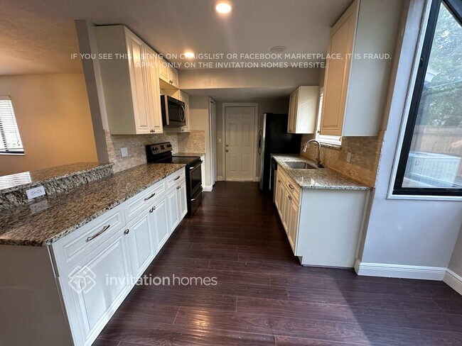 Foto del edificio - 3908 Woodglade Cove